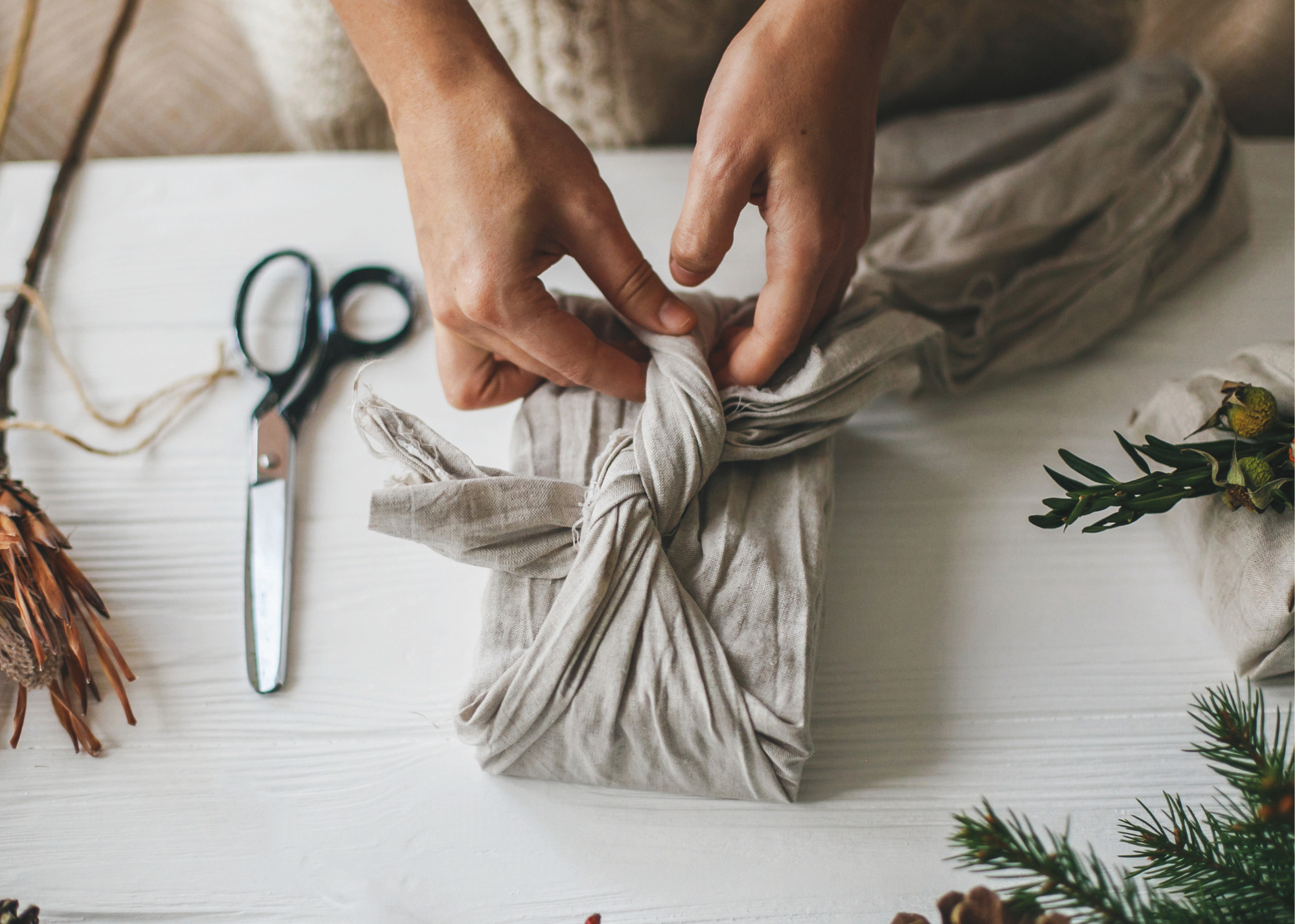 Learn how to wrap presents using fabric Furoshiki cloths